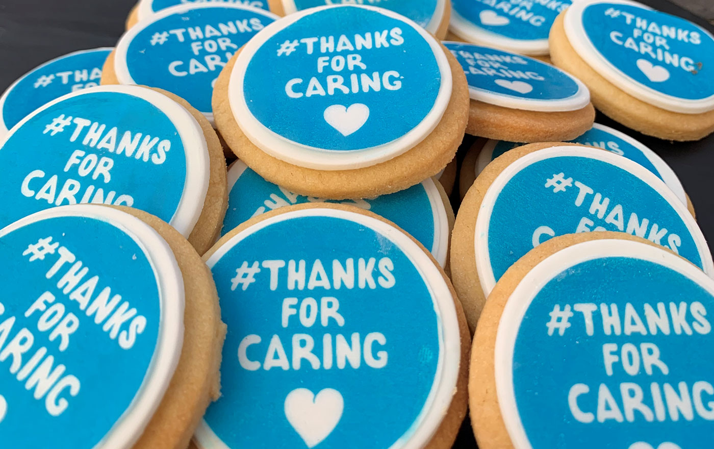 Cookies that read 'Thanks for Caring'