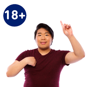 A man pointing at himself with his other hand raised. The number 18 with a plus symbol is behind him.